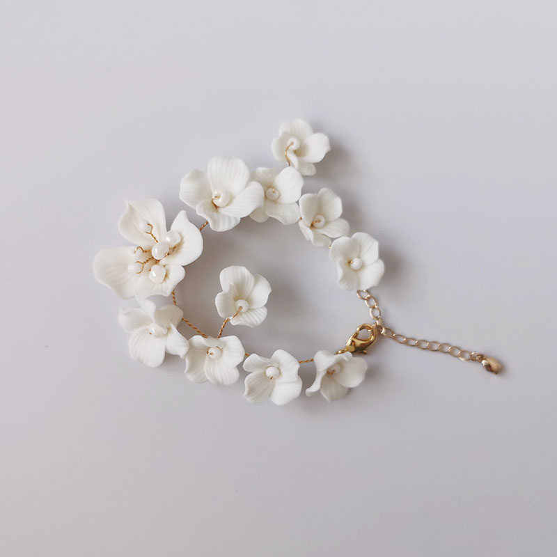 女性のための花の形をした白い磁器のブレスレット,手作りのアー - Snake Plant Ceramic のレビューと価格